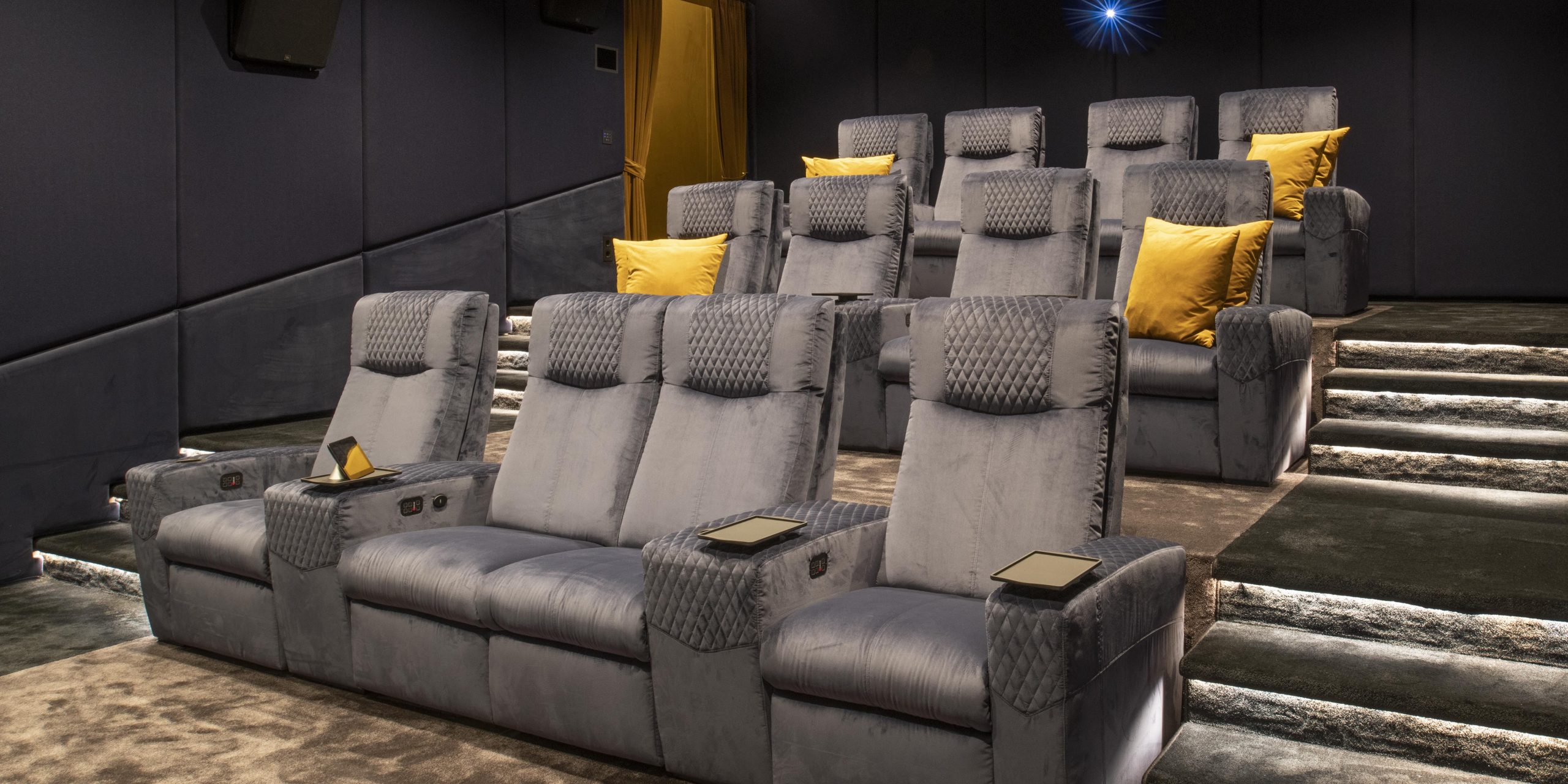 Cineak Luxury Home cinema with Ferrier seating. Roland Koller Signature Design