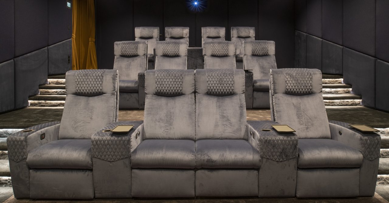 Luxury Home theatre with Ferrier cineak seating. Roland Koller Signature Design front