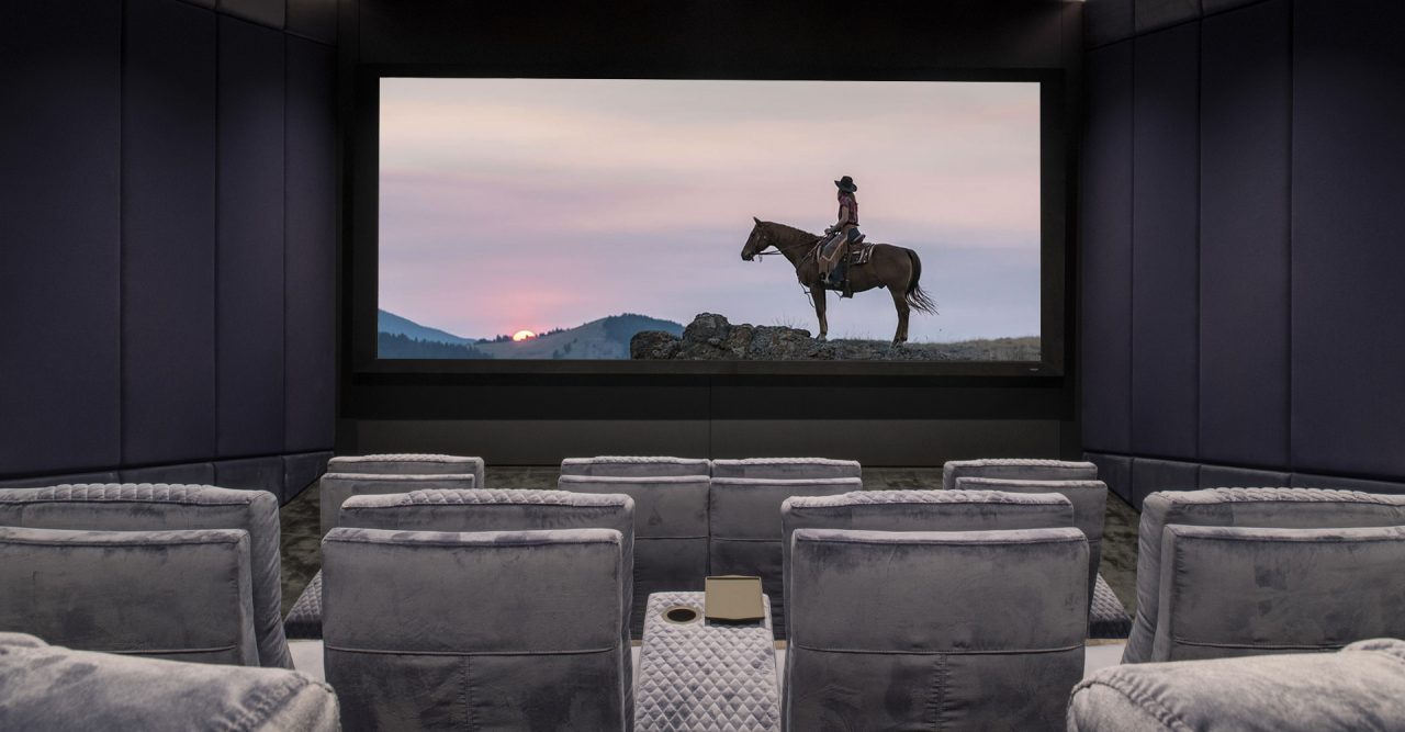 Luxury Home theater with cineak Ferrier seating. Roland Koller Signature Design